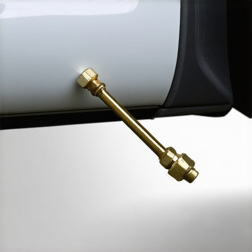 Close-up of a Fumoto ball valve installed on an oil pan to prevent thread wear.